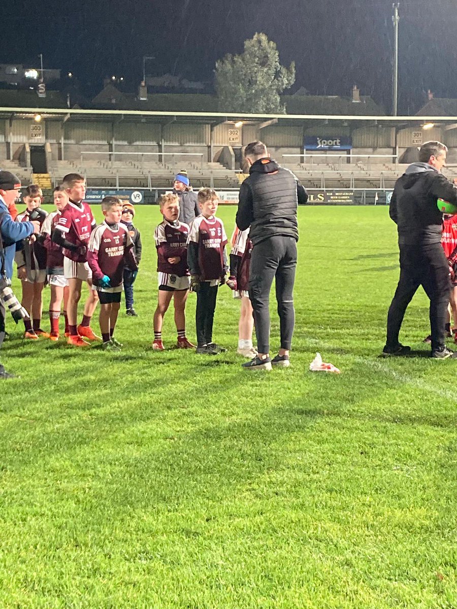 Ballymacnab_GAA's tweet photo. Well done to our Flag bearer Finn McArdle and his Under 10 side who took part in tonight events at the Box IT Athletic Grounds https://t.co/NMXspS6Dsf