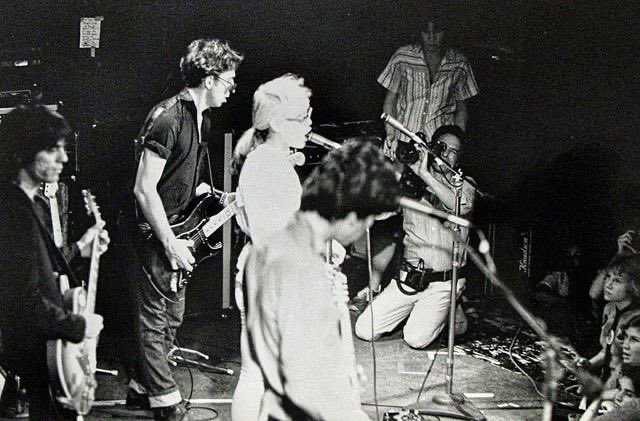 John Cassavetes birthday. Here he is shooting film of Blondie at the Whiskey in 77. Photo by the great <a href="/SamShawPhoto/">Sam Shaw</a>