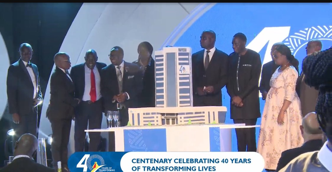 lykadalia's tweet photo. @CentenaryBank The group board chair, Guest of Honor, MD, Executive director pose for a photo before they cut cake.
#CenteAt40 https://t.co/D8ksoRHtQ7