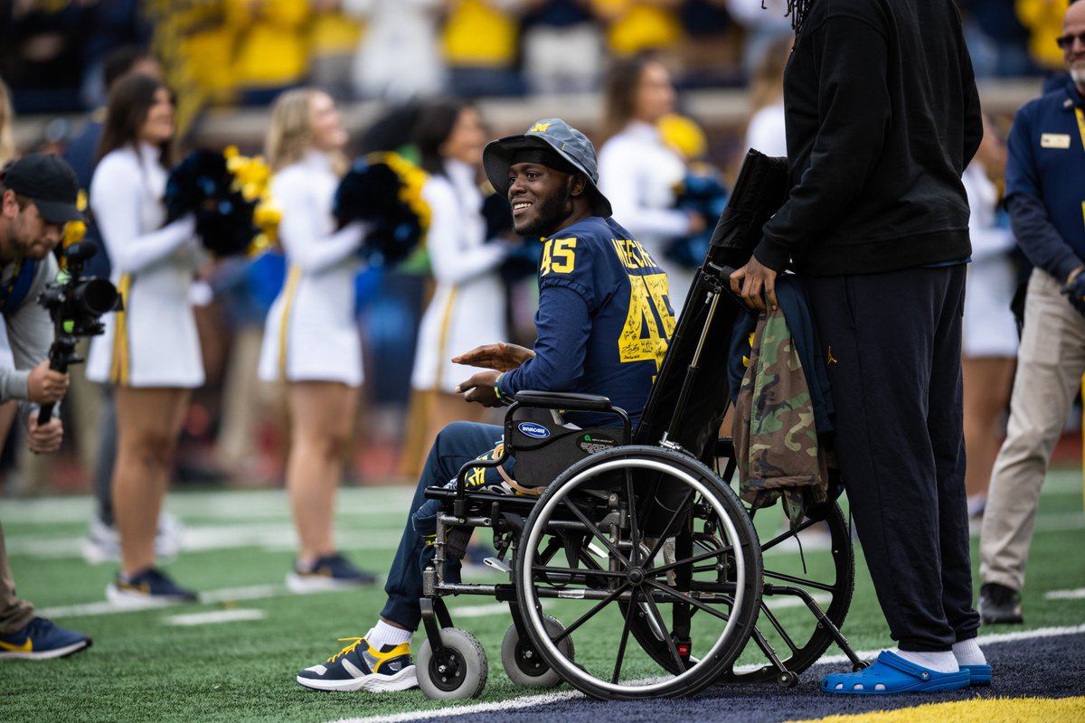 UMichFootball's tweet photo. Remembering our friend Meechie 💙 https://t.co/1ugj7bcz88
