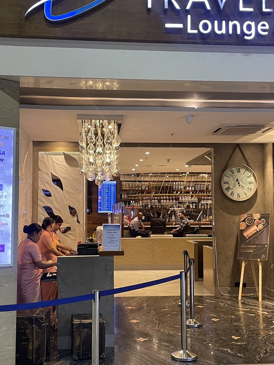 Sarafprasang's tweet photo. Unbelievable scene at Mumbai Airport's T1 lounge! 3 dedicated staff members standing for 9 hours straight with no chairs provided Let's prioritize basic workplace comfort &amp; decency @CSIAMumbai, @JM_Scindia , @MoCA_GoI @AAI_Official @CSMIA_Official https://t.co/1YrXPDeVtP
