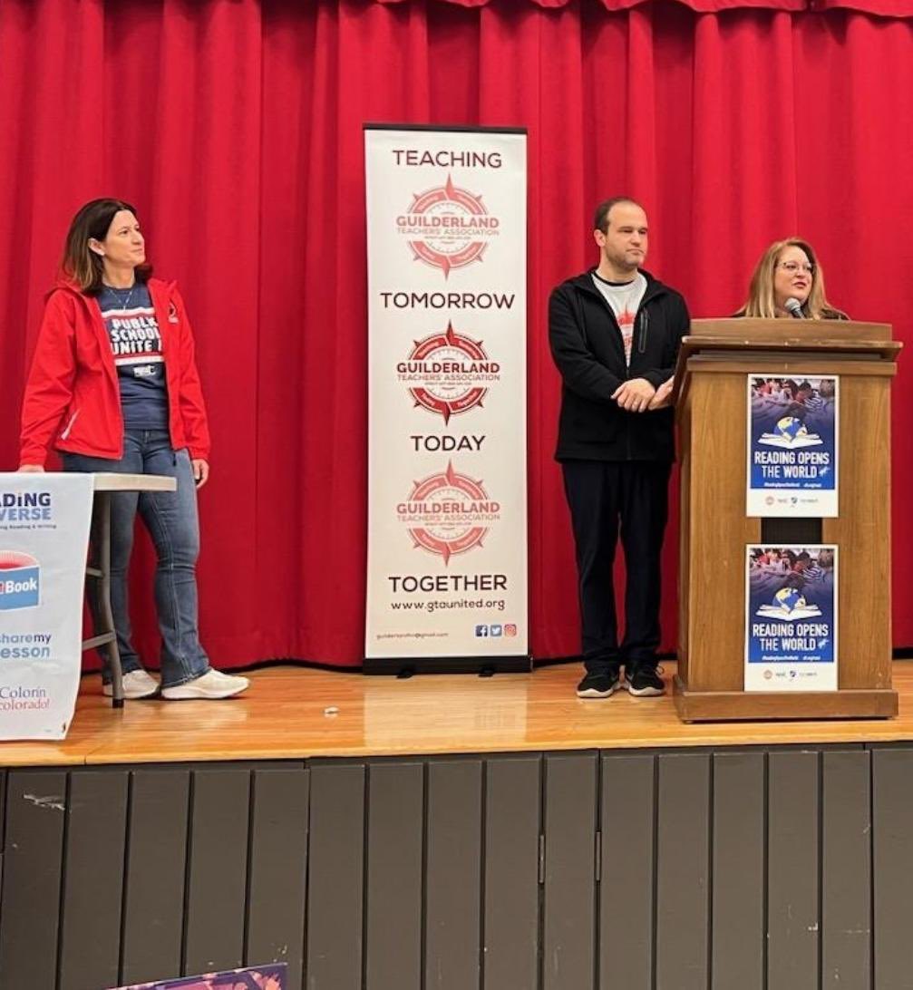 Today's #ReadingOpensTheWorld event at Farnsworth Middle School, hosted by @GTAUnite @NYSUT & @AFTunion, was a huge success. 🙌 10,000 books distributed to support a culture of reading @GuilderlandCSD. Thank you to everyone who helped get the words out (see what I did there?) 📚