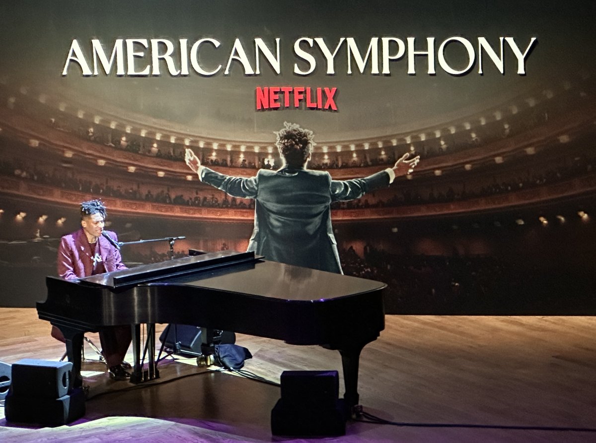 KimCBergeron's tweet photo. NOLA premiere of @Netflix #AmericanSymphony w @JonBatiste &amp; @suleikajaouad, w intro by @MichelleObama was transcendental. Such a heartwarming story of love, courage, vulnerability, and triumph, beautifully filmed and edited together in a masterful visual symphony of storytelling. https://t.co/ZHhXDES40M