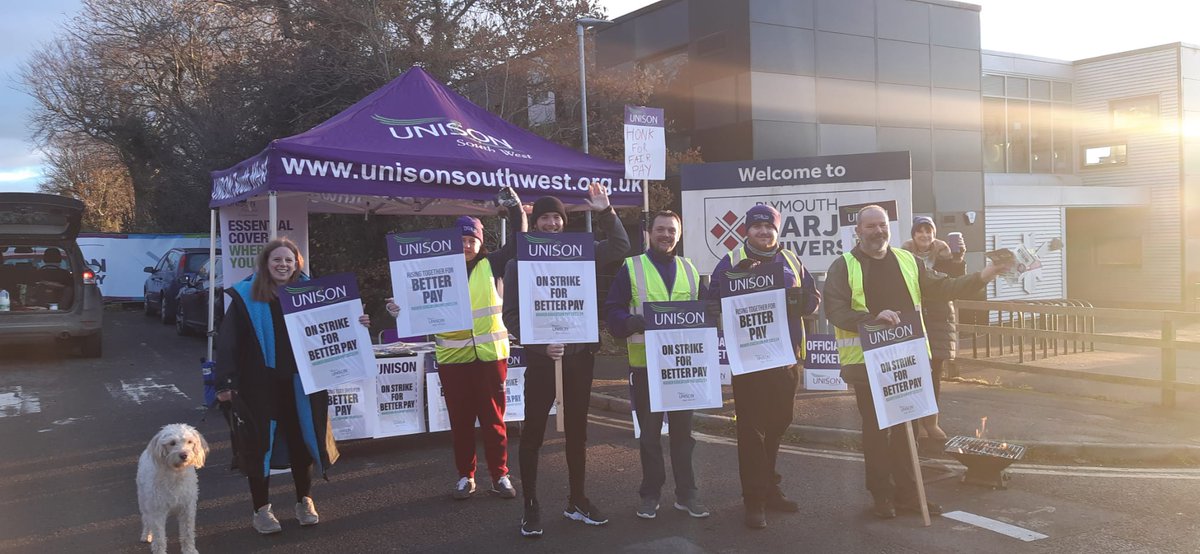 UoPUnison's tweet photo. A crisp and sunny November day on the picket line at Marjon today. #RisingForBetterPay #CostOfLiving #Solidarity #payupnow #picketlinepooches https://t.co/FeSIv5y5Ea