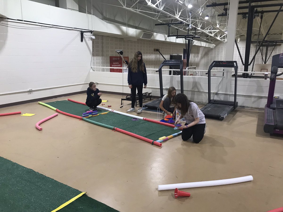 Sixth grade using their STEM skills to design our mini golf course