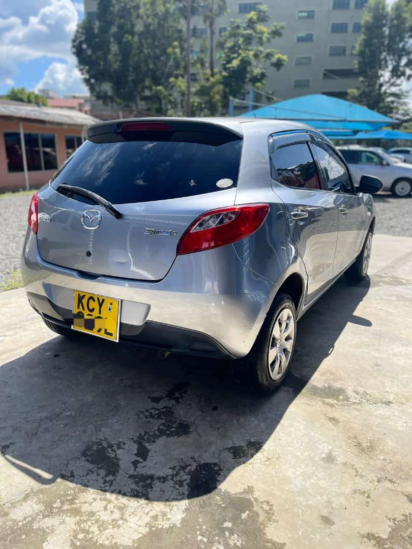 Super clean Mazda demio Year 2013 1300cc 84000km Price 700k WhatsApp 0713642110