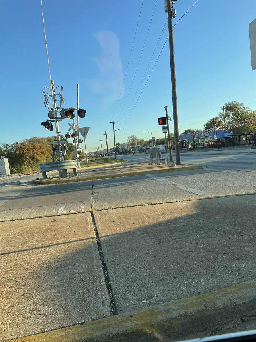 rylamar's tweet photo. @WalkableDFW bus stop on an island in FW between railroad tracks and 3-way intersection. Saw a person in a wheelchair managed to get there once. https://t.co/CqIbZPyaF1
