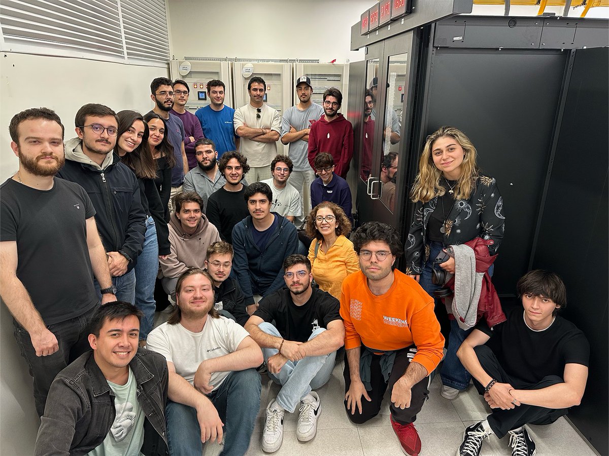 Had a blast with my parallel computing class visiting the campus  cluster! 😄 One student opted out of the pic, so we got creative and  replaced them with an AI-generated person. Can you guess who?  Btw, this is half of the class, couldn't fit all in one pic. #ParallelComputing