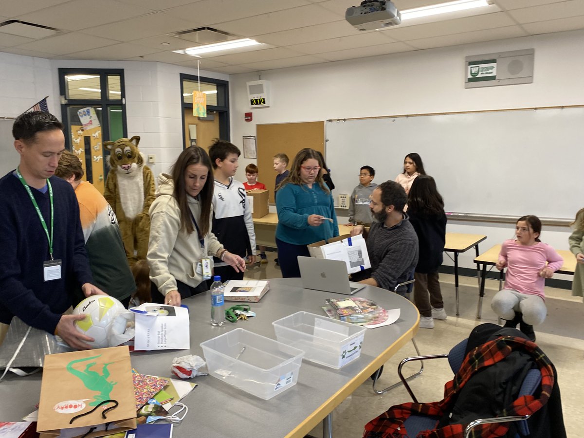 Woodland50News's tweet photo. Trimester 1 ROAR Raffle @d50intermediate 
Students earned ROAR tickets by making good choices, and entered their names into the prize boxes they hoped to win. Thank you to @VillageofGurnee Mayor Hood, @RobertMachak &amp; Wiley for celebrating these student leaders! #LifeintheW https://t.co/pAHJUHeF0h