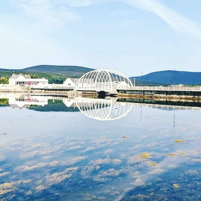 We hope you're all having a tranquil Tuesday....and we hope you like our pic today, with  a view of the Achill Sound Bridge, reflecting onto the sea, almost sphere like...

#amazingachill #achill #achillisland #Achilladventures #BridgeBeauty #DiscoverAchill #wildatlanticway