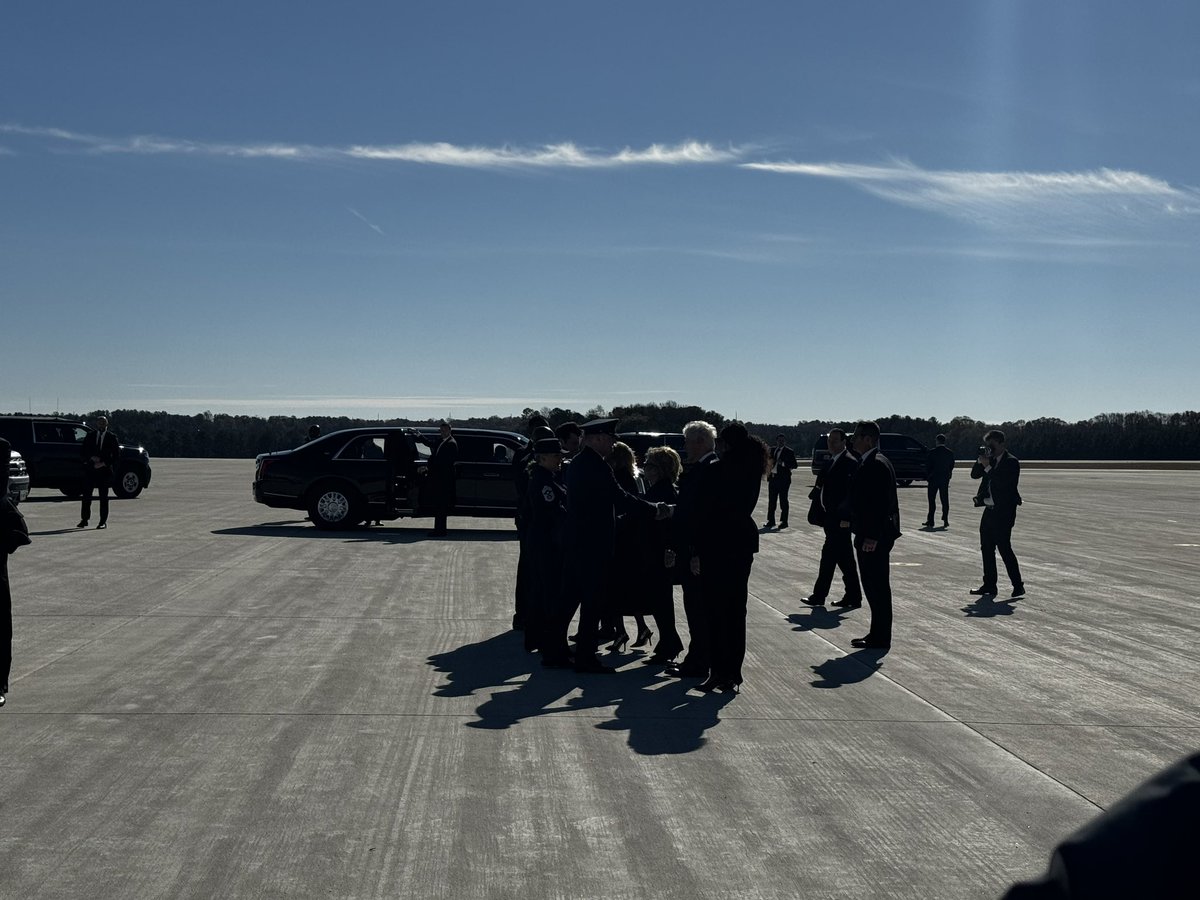 Joe and Jill Biden, Bill and Hillary Clinton, and Michelle Obama on the tarmac in Atlanta ahead of the Rosalynn Carter funeral