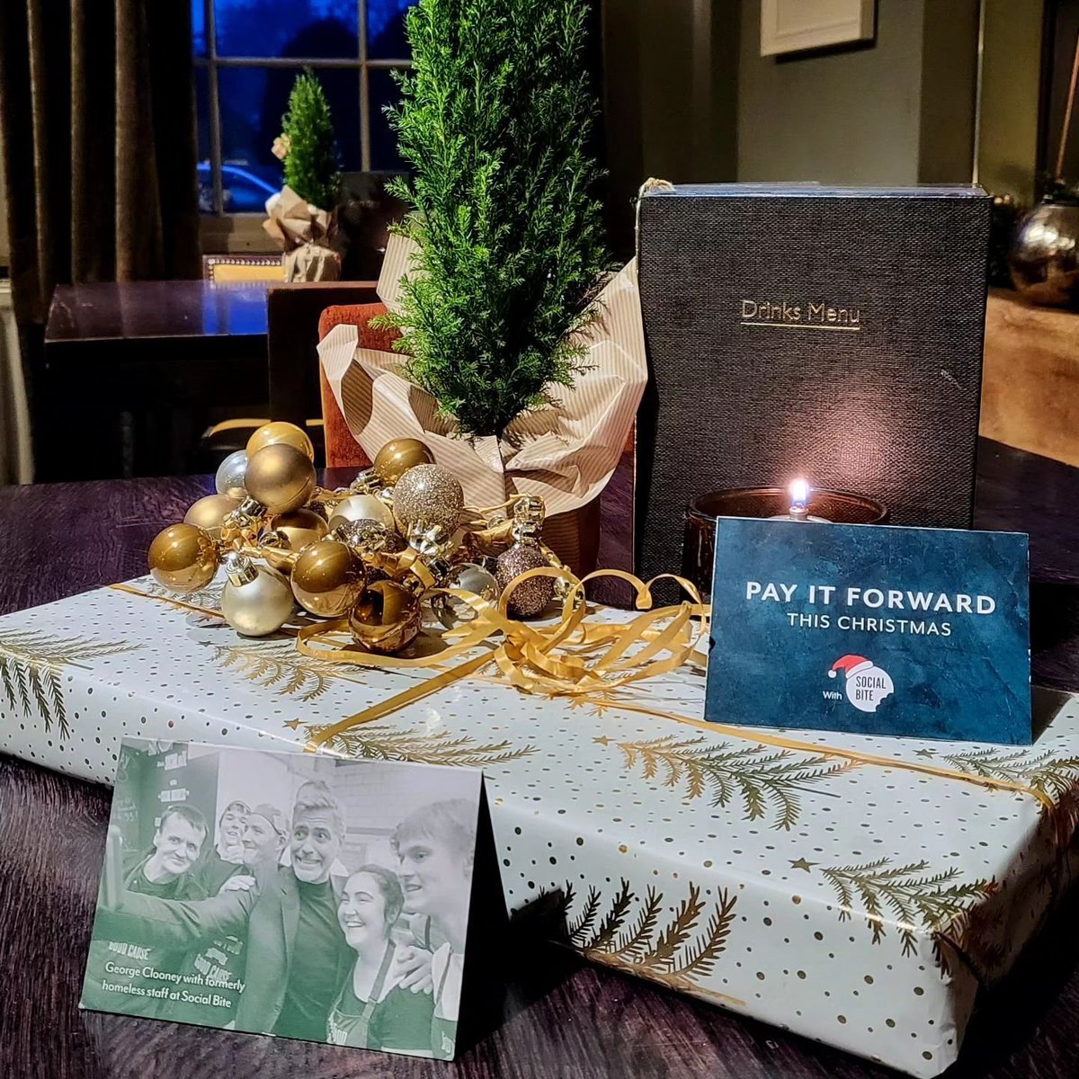 SocialBite_'s tweet photo. This #GivingTuesday, we're spotlighting the #PayItForward campaign at @eatdrinkmb venues UK-wide. Look for these cards to make a donation this December at @tobycarvery, @HarvesterUK, @allbarone, @MillerandCarter and many more.  Find your nearest location – https://t.co/o5FBfIcu6G https://t.co/cMgkVUkUkw
