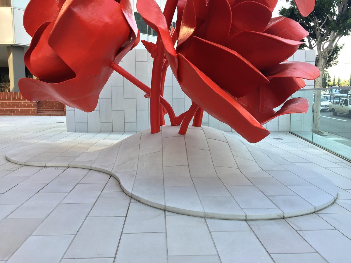 The Michael Maltzan designed Art Mound rises from a field of New Pearl Limestone pavers, and contains 70 unique shapes, each hand carved from high-density limestone blocks. A true work of art. @michaelmaltzanarchitecture #naturalstone #handcraftedstone #carvedstone #stonearchi