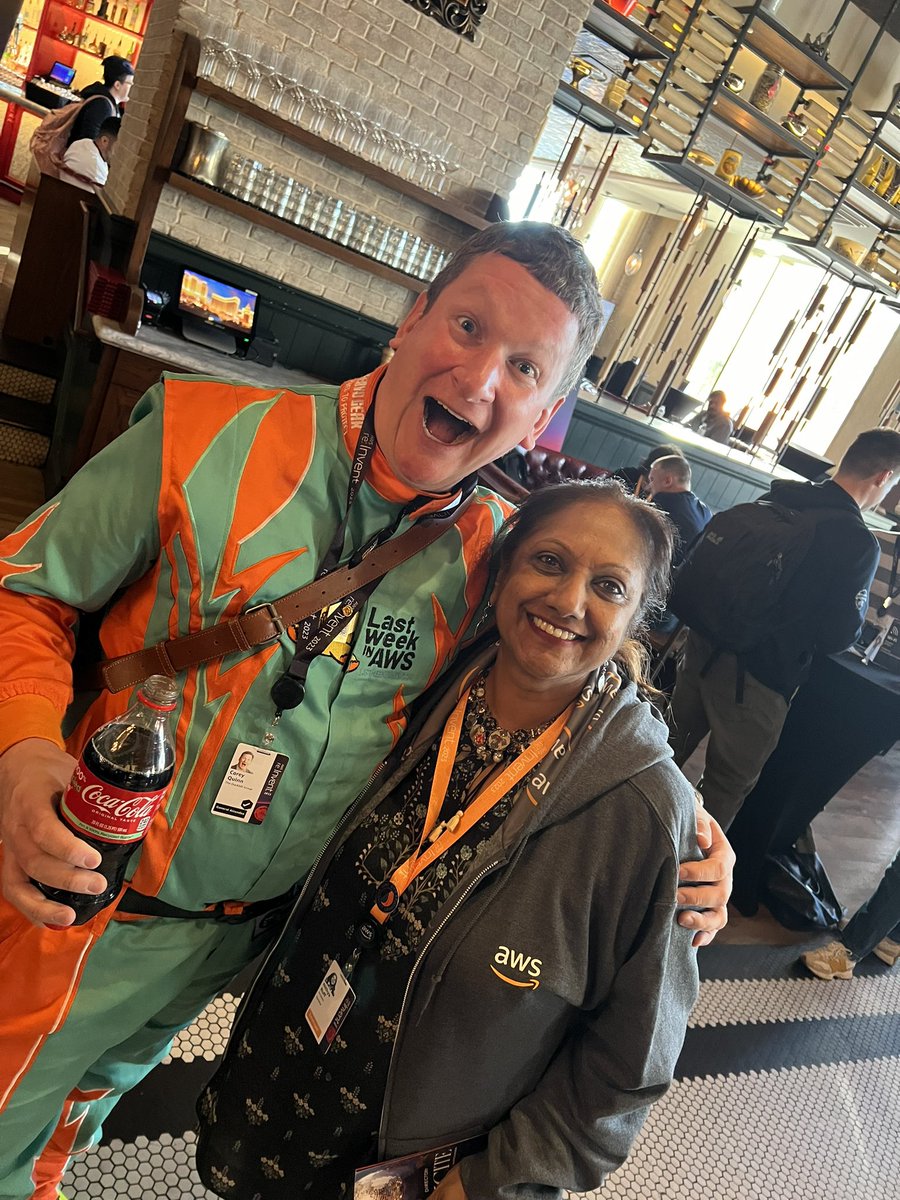 nithyaruff's tweet image. Pictures from day 1 of #awsreinvent2023 . And can I say that @QuinnyPig owns the best dressed award. Not only was it a nod to the F1 circuit that was here in Vegas last week but also reflective of the unique perspectives that only Corey brings.  @ArundeepNagaraj &amp;amp; Amber Graner.