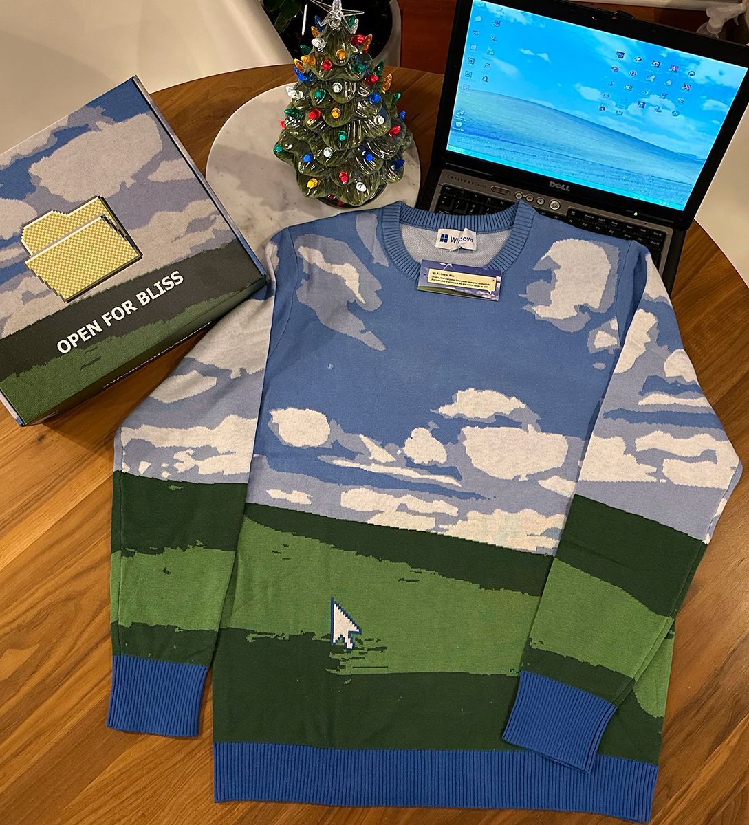 Just got an early holiday gift from @Windows! Check out this amazing, nostalgic ugly sweater they sent over. Loving the bliss vibes! #WindowsXP #WindowsUglySweater