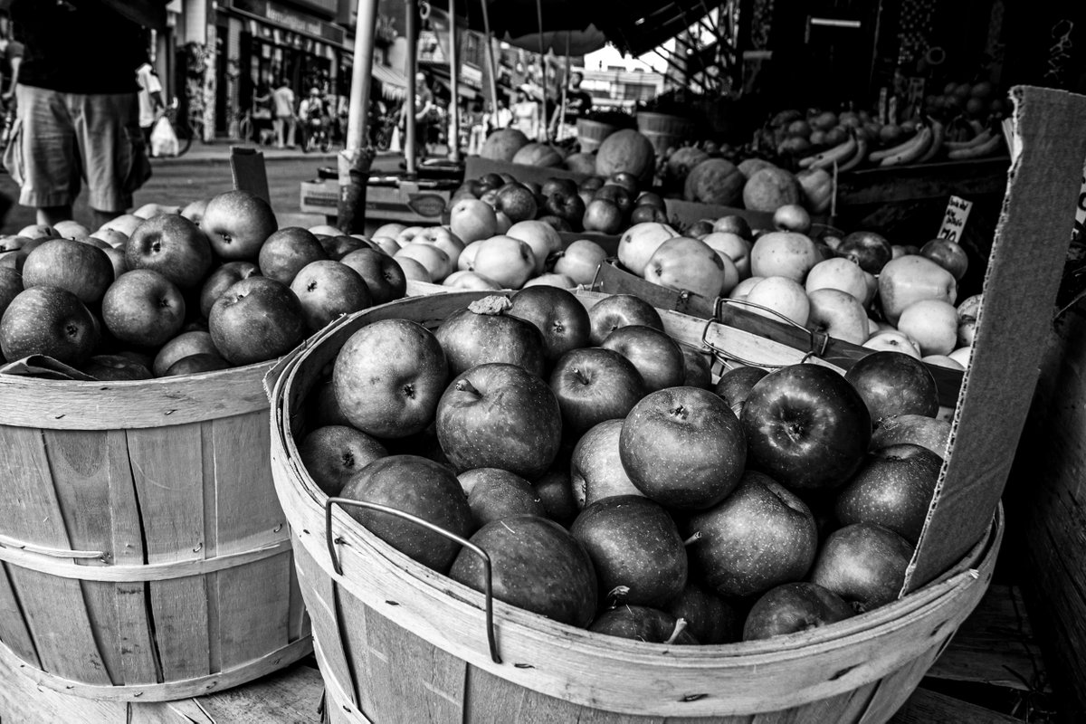 I don't do a lot of #blackandwhite photography. It can look pretty cool.  I like when there's a lot of different subjects and shades/contrast in the lights. 

This is #kensingtonmarket in #toronto in like 2014?   Feel free to add your black and white photos if you want, too!