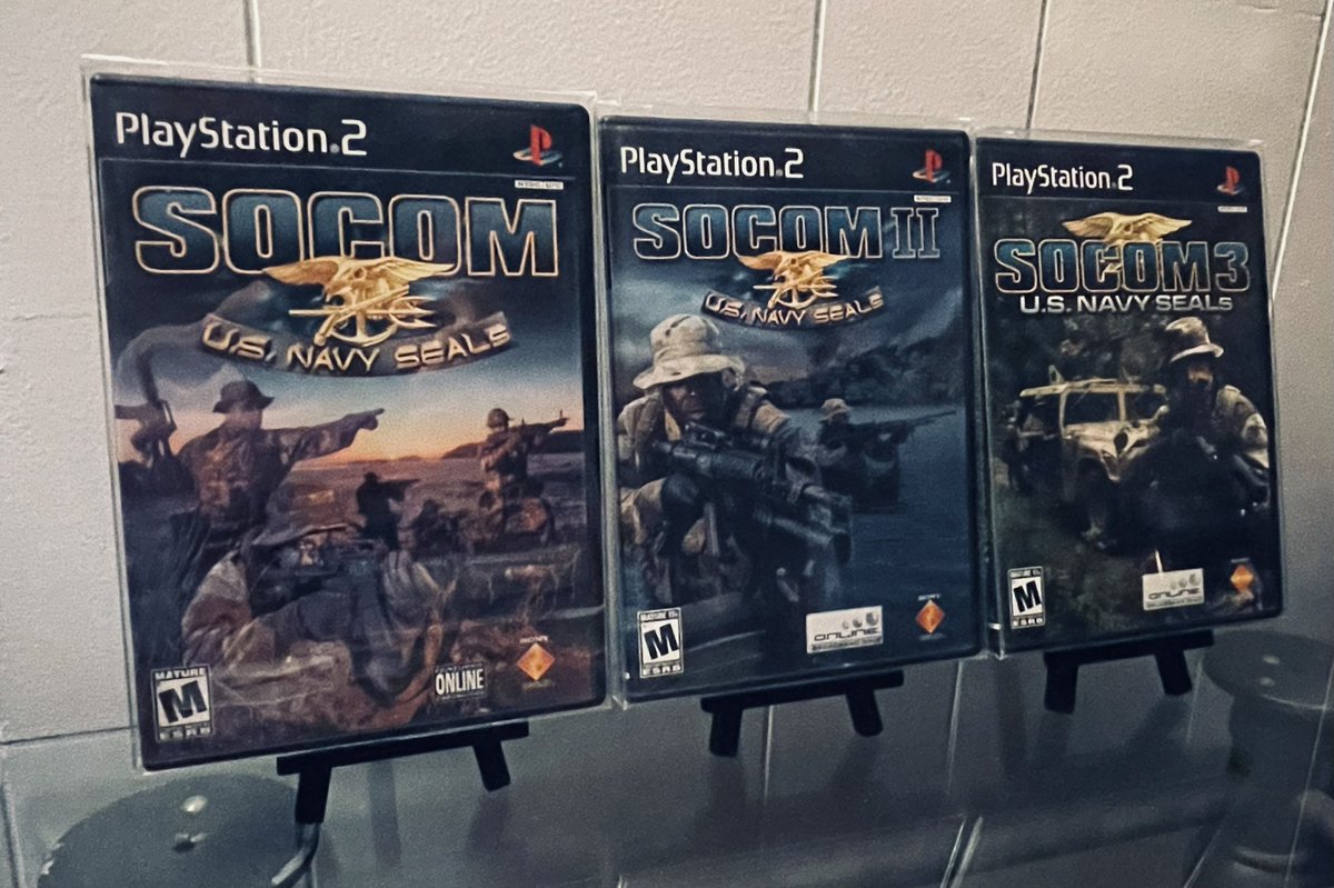 FakePearBear's tweet photo. For #TrilogyTuesday we have the absolutely exquisite squad military shooter, SOCOM : U.S. Navy SEALs on the PlayStation 2. In the early 2000s, these games forged new paths for online team-based tactical combat on console while also boasting a solid campaign, and popularized the third-person shooter genre further at a time when FPS ruled the world.
While all three titles are stunning in their own right, it was SOCOM II that really put this franchise on the map, and at the time of its release in 2003 was widely considered to be a near-flawless game, scoring multiple perfect reviews across the entire industry.
If you’re looking for a solid military shooter trilogy that still holds up to this day, give these three a shot the next time you go looking for some new games to add to your collection. All of these can usually be found around or well under $10 each #gaming #sony #retro