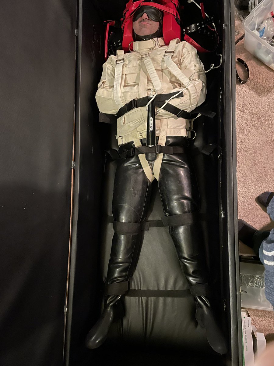 BondageJosh's tweet photo. @finding33848271 complained he was cold, so he’s spending the evening in a very thick rubber suit, heavy canvas straight jacket, and locked in the isolation box https://t.co/mNe4JcjiCM
