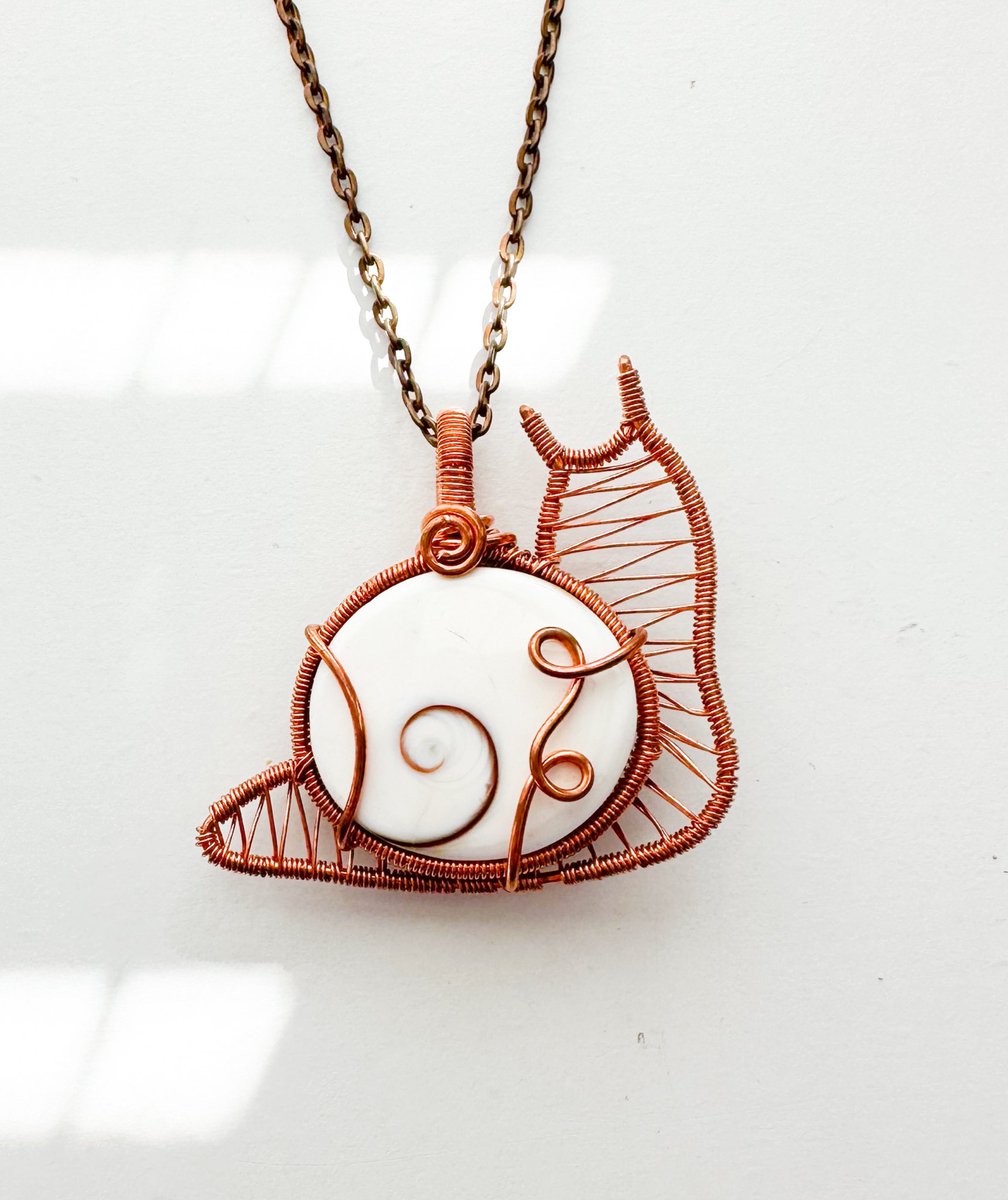 mildhippie's tweet photo. milk snail pendant necklace 🐌🥛

available Dec. 1st at 8pm eastern time <3 https://t.co/axxlGiOsYe