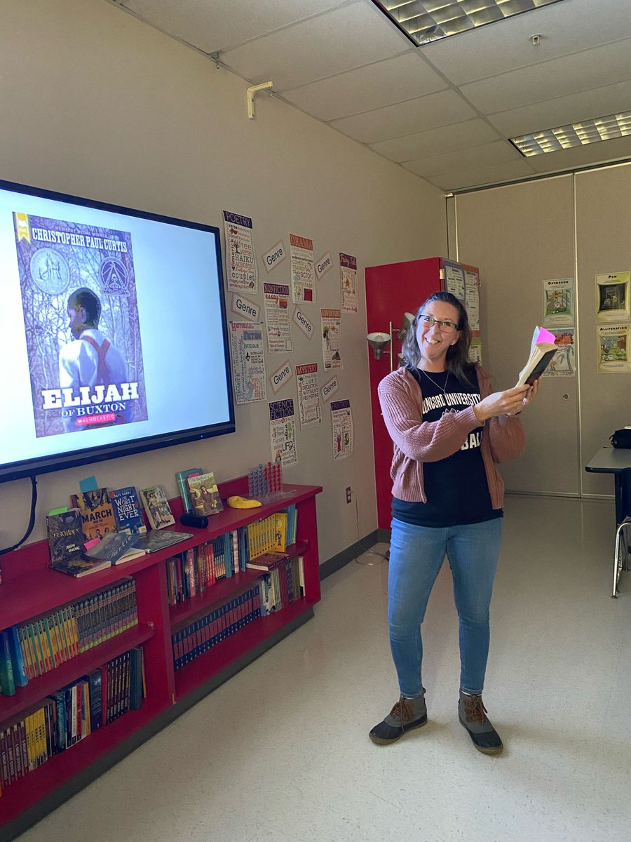 Seventh grade science teacher and cross country coach, Mrs. Ferguson guest reading in Ms. Distler's sixth grade English class!