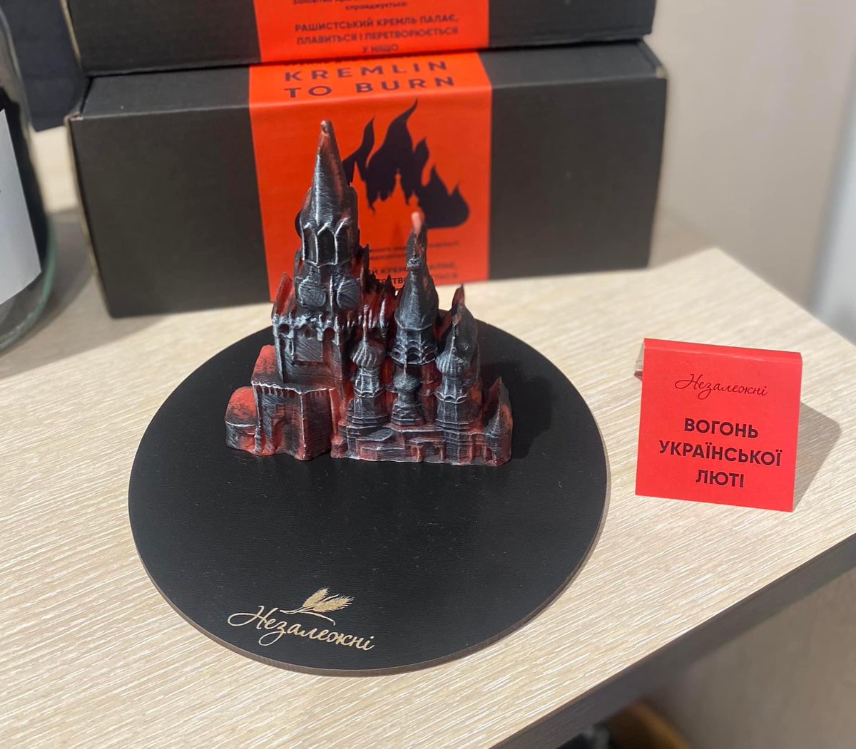 A candle is being done in Odessa by woman from Mariupol. She casts kremlin to be burned. She named them "The Fire of Ukrainian Rage".