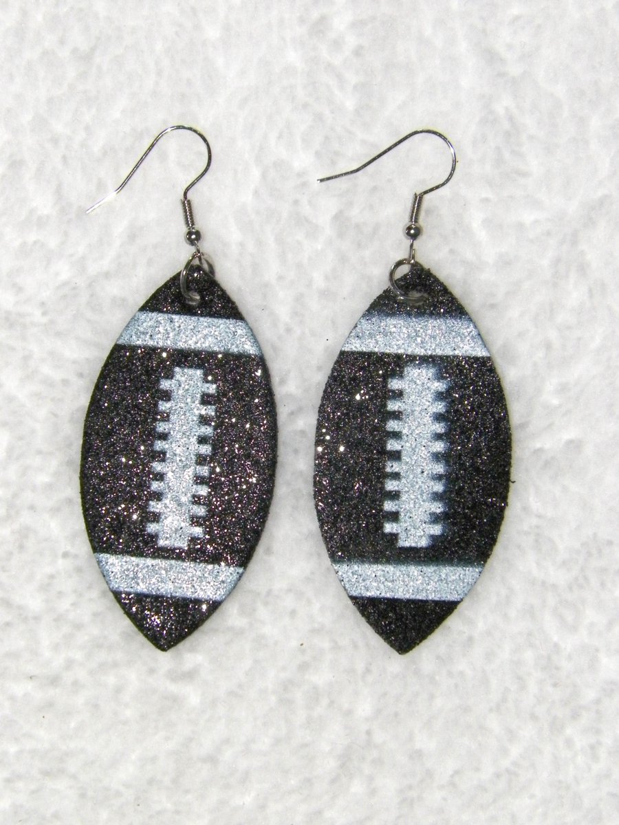 Check out NEW 2 1/4" Black Glitter Football Earrings ebay.com/itm/1262075288… #eBay via <a href="/eBay/">eBay</a> #ferdsplace #the_treasure_ace #doubleretail #amandaleejewelry #reneelily
