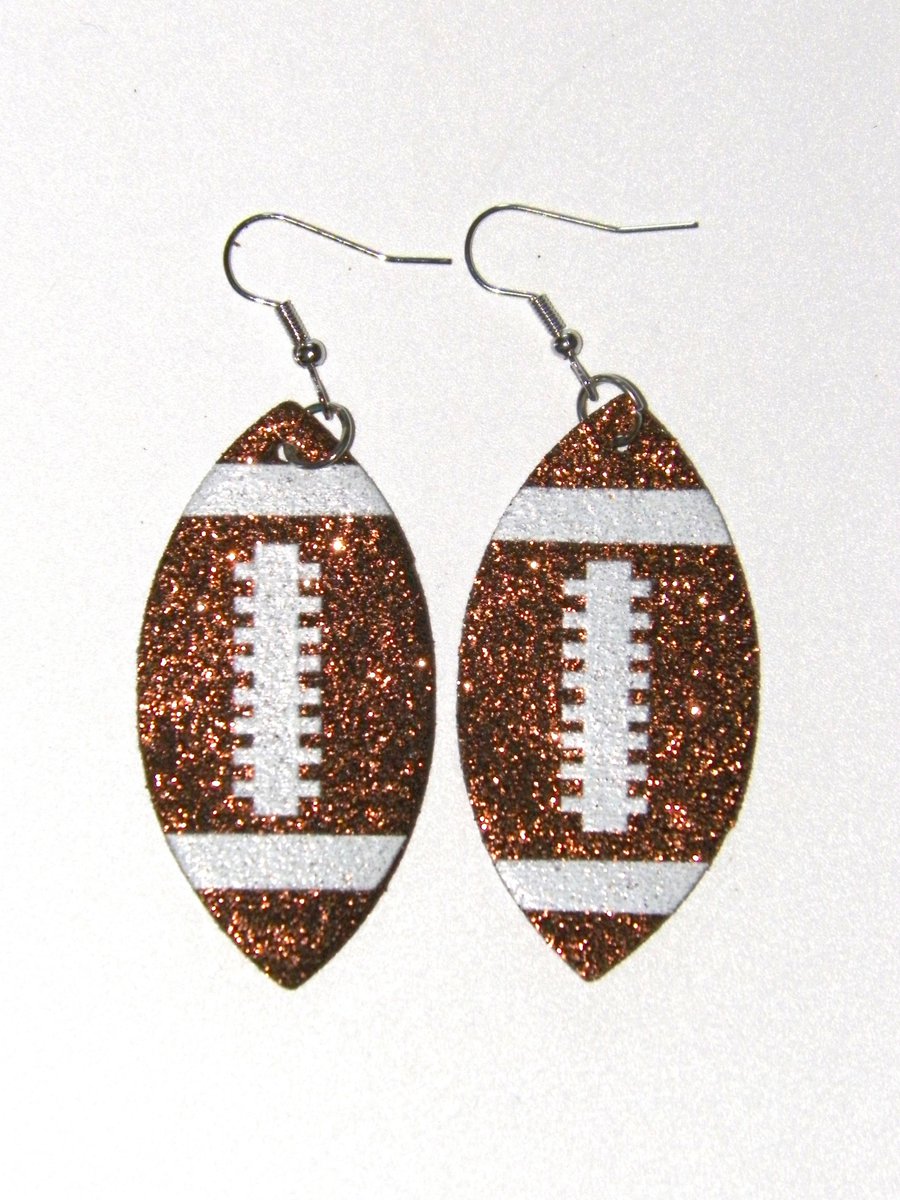 Check out NEW 2 1/4" Brown Glitter Football Earrings ebay.com/itm/1262075293… #eBay via <a href="/eBay/">eBay</a> #ferdsplace #the_treasure_ace #doubleretail #amandaleejewelry #reneelily