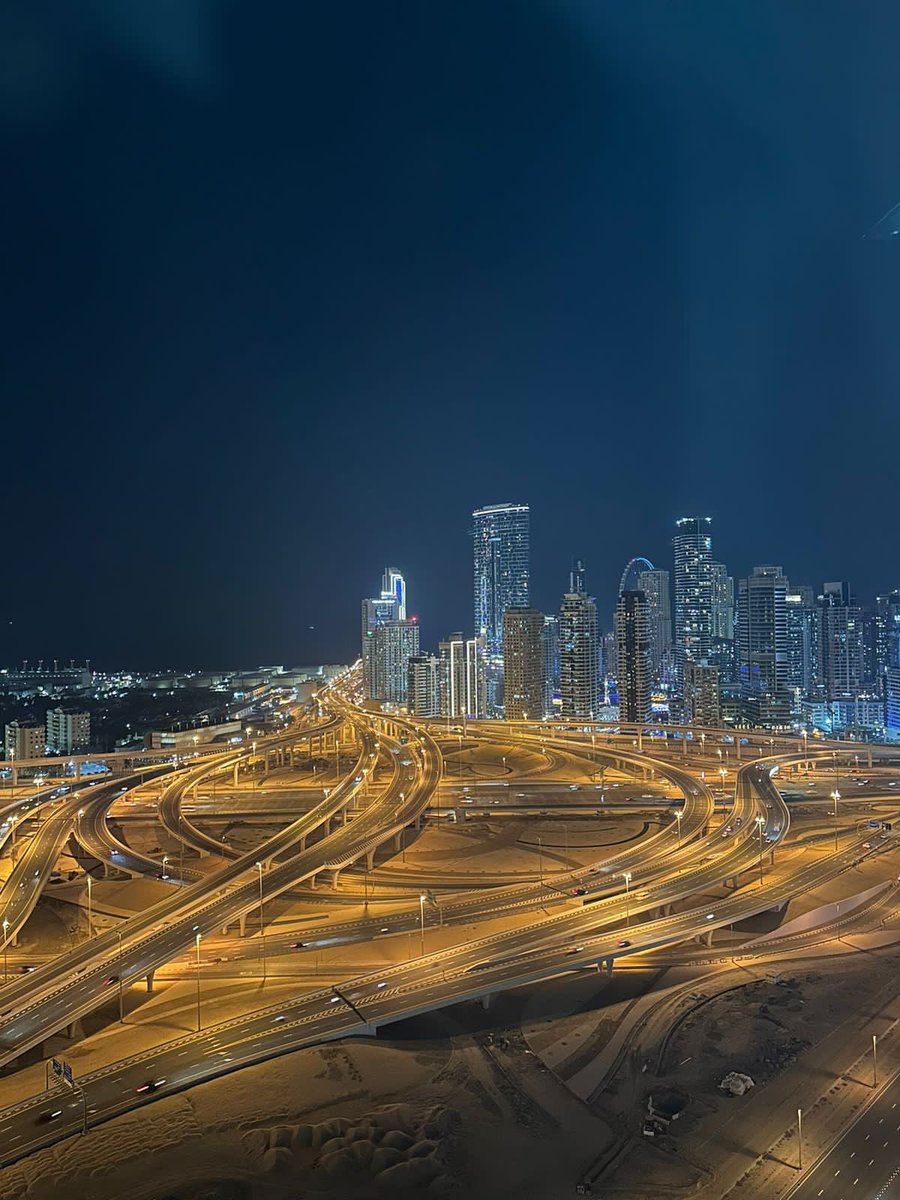 WhiteCrowRPO's tweet photo. Twenty-nine floors beneath, the city bustles in its nocturnal symphony, each light a story untold, each glow a whispered promise of dreams yet to unfold.

#whitecrow #dubai #officevistas #cityscapes https://t.co/ju4Ddf9x0G