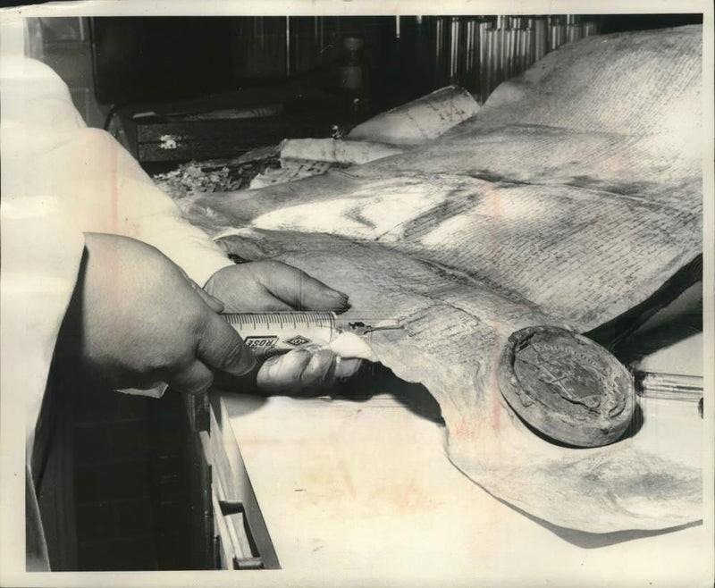 T3Uncoupled's tweet image. A Benedictine monk injects vitamins into a 14th century paper to restore its vitality. (1963)