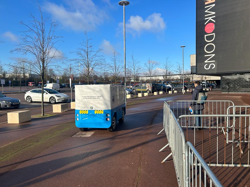 As part of the @LivingLAPT project the #LMDrobot using the AppliedAutonomy fleet management network drives around the MK stadion. Yesterday it was our lovely duty to show the robot in practice to representatives of the MK city and @EITUrbanMob which protects the entire project