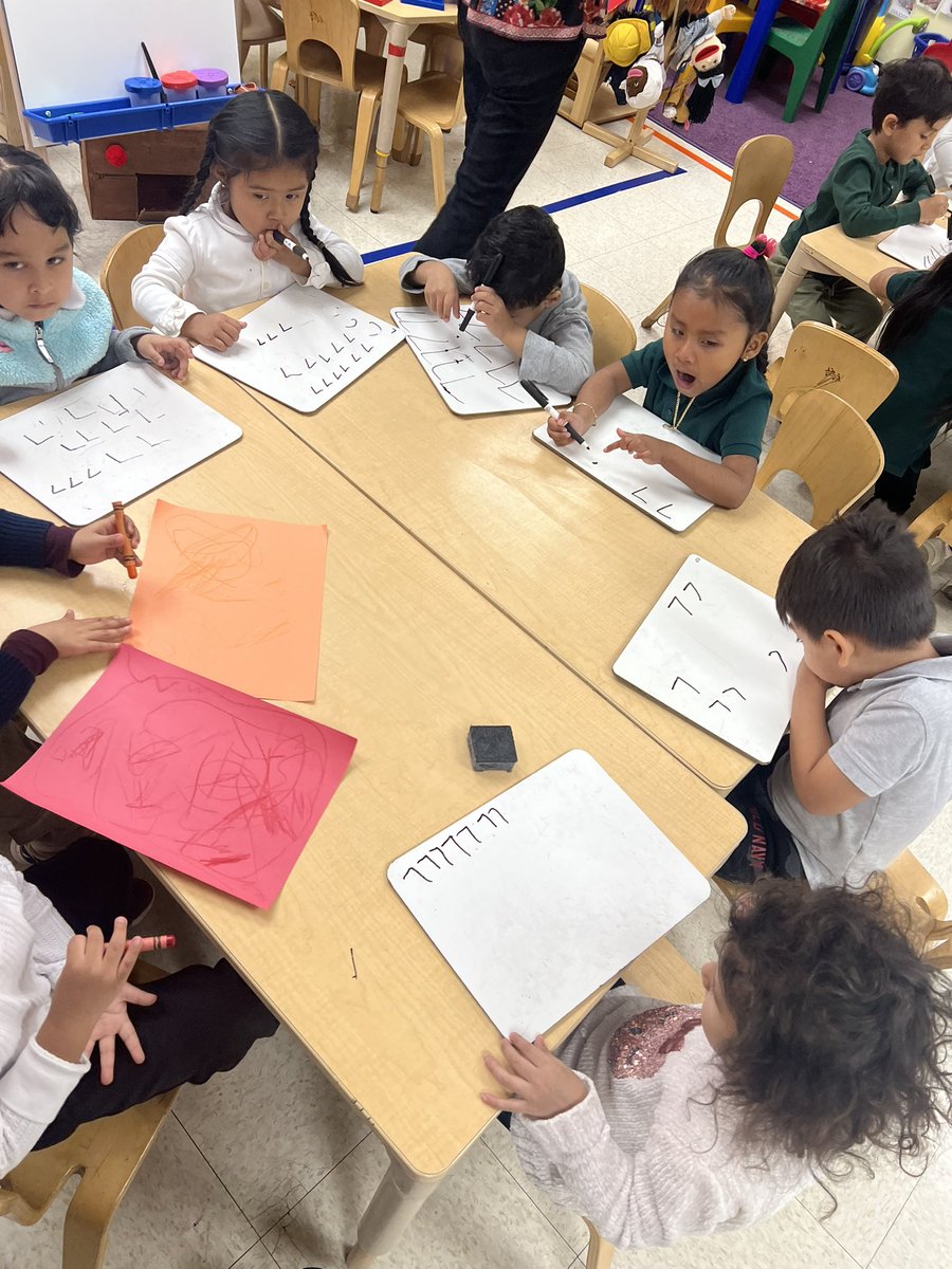 Writing the number 7 during Graphics Practice! Great job🙂