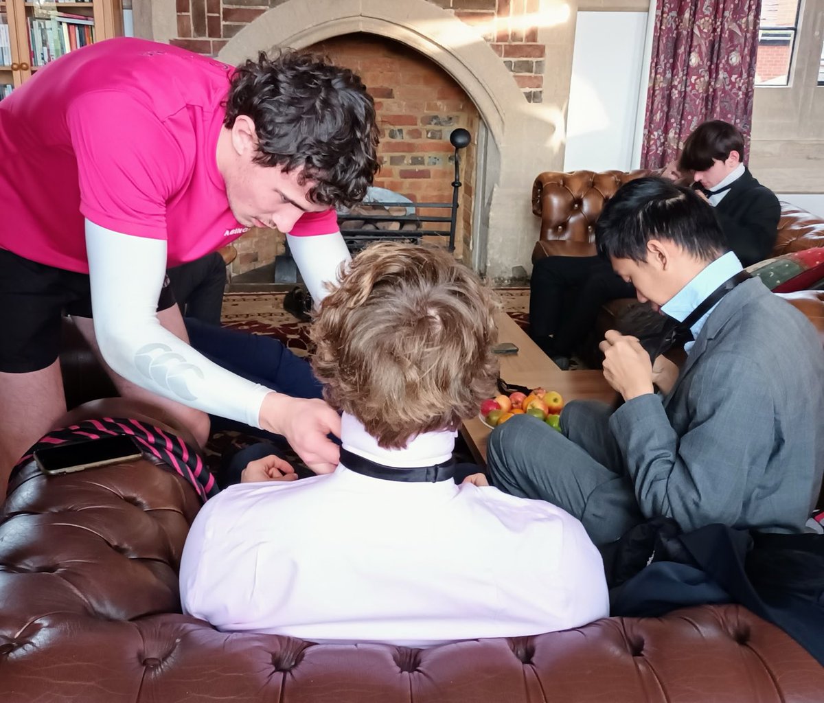 Learning to tie bow-ties, badly. Wednesday afternoon life skills for the Upper Sixth.