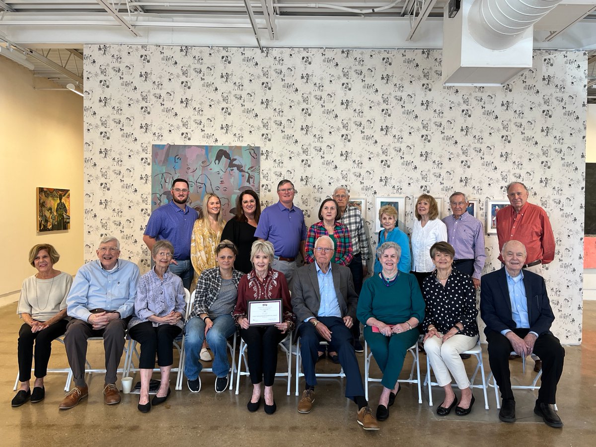 A heartfelt birthday surprise!  🎉 Jack Benson presented a new fellowship to his wife, Carol Tomkins Benson, MFA ’02, surrounded by their close friends and family. 🔗 bit.ly/47QSvBN