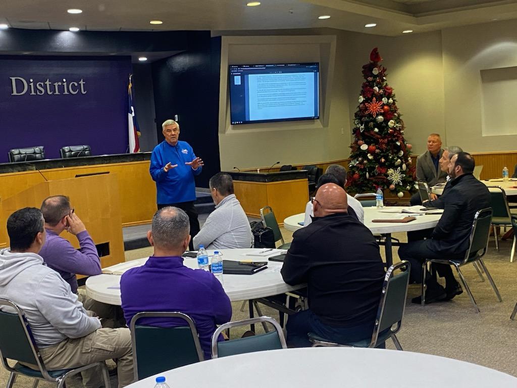 Executive Director Sam Tipton speaks to the athletic directors in Weslaco today.