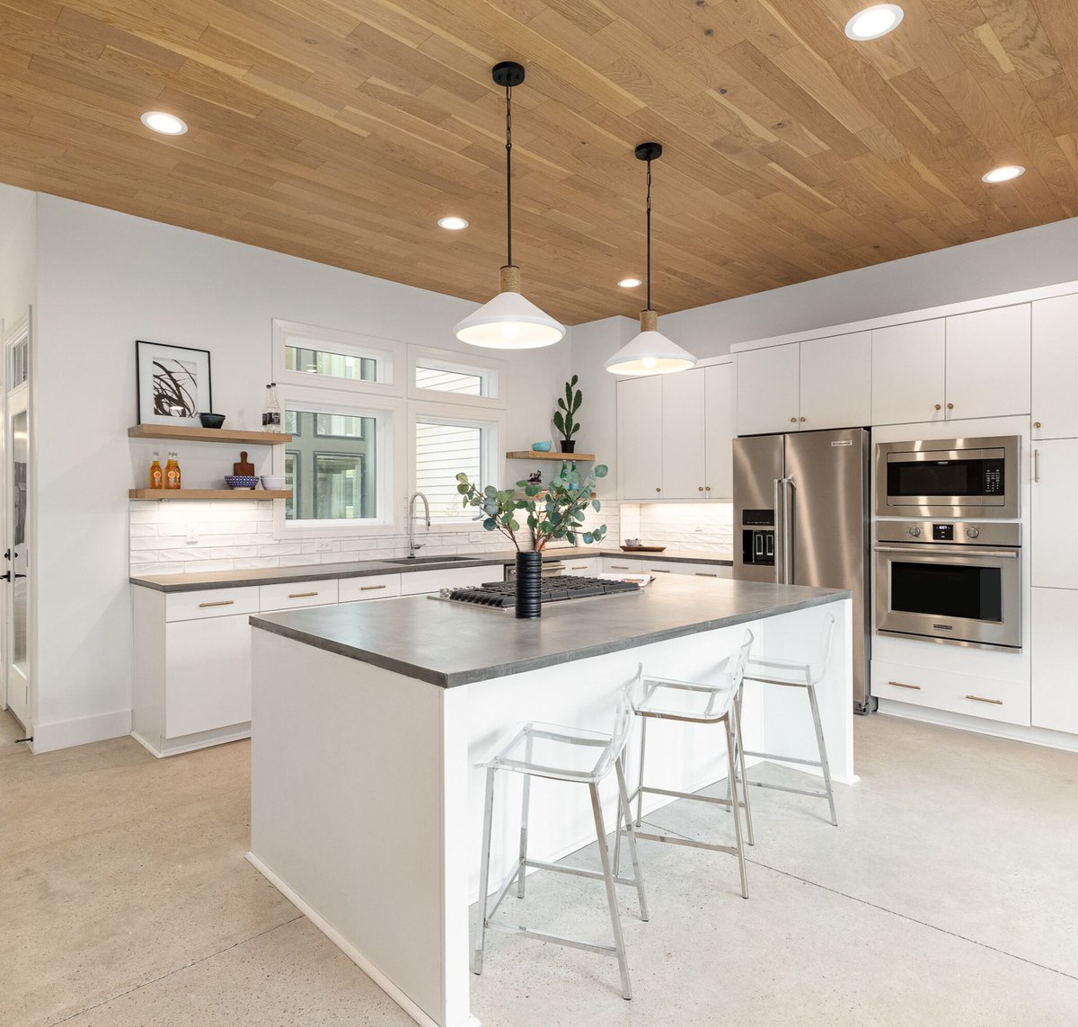 Elevate your kitchen with concrete countertops. 🌟 Yearly sealing keeps them timeless. We call this style Industrial Zen, and it's vibe is incomparable. #KitchenDesign #TheSoulfulHome #SleekDesign #UnderstatedElegance #HomeTrendsetter #ModernKitchen