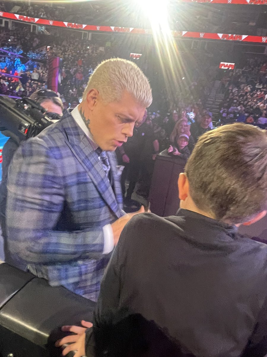 Drekennedy_83's tweet photo. The internet is a crazy place so let me say: he wasn’t a plant, he’s not a make a wish &amp; the autos aren’t going on eBay like ppl have suggested. Just a 7 yr old wrestling fan hanging w/ his dad at #WWERaw. Thanks to @RandyOrton, @CMPunk &amp; @CodyRhodes for taking the time! https://t.co/rtBiRvHNZm
