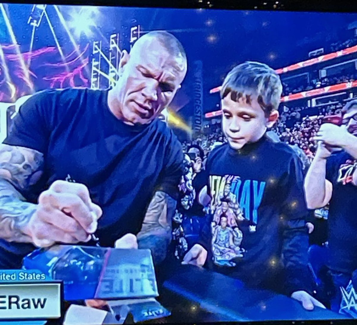 Drekennedy_83's tweet photo. The internet is a crazy place so let me say: he wasn’t a plant, he’s not a make a wish &amp; the autos aren’t going on eBay like ppl have suggested. Just a 7 yr old wrestling fan hanging w/ his dad at #WWERaw. Thanks to @RandyOrton, @CMPunk &amp; @CodyRhodes for taking the time! https://t.co/rtBiRvHNZm