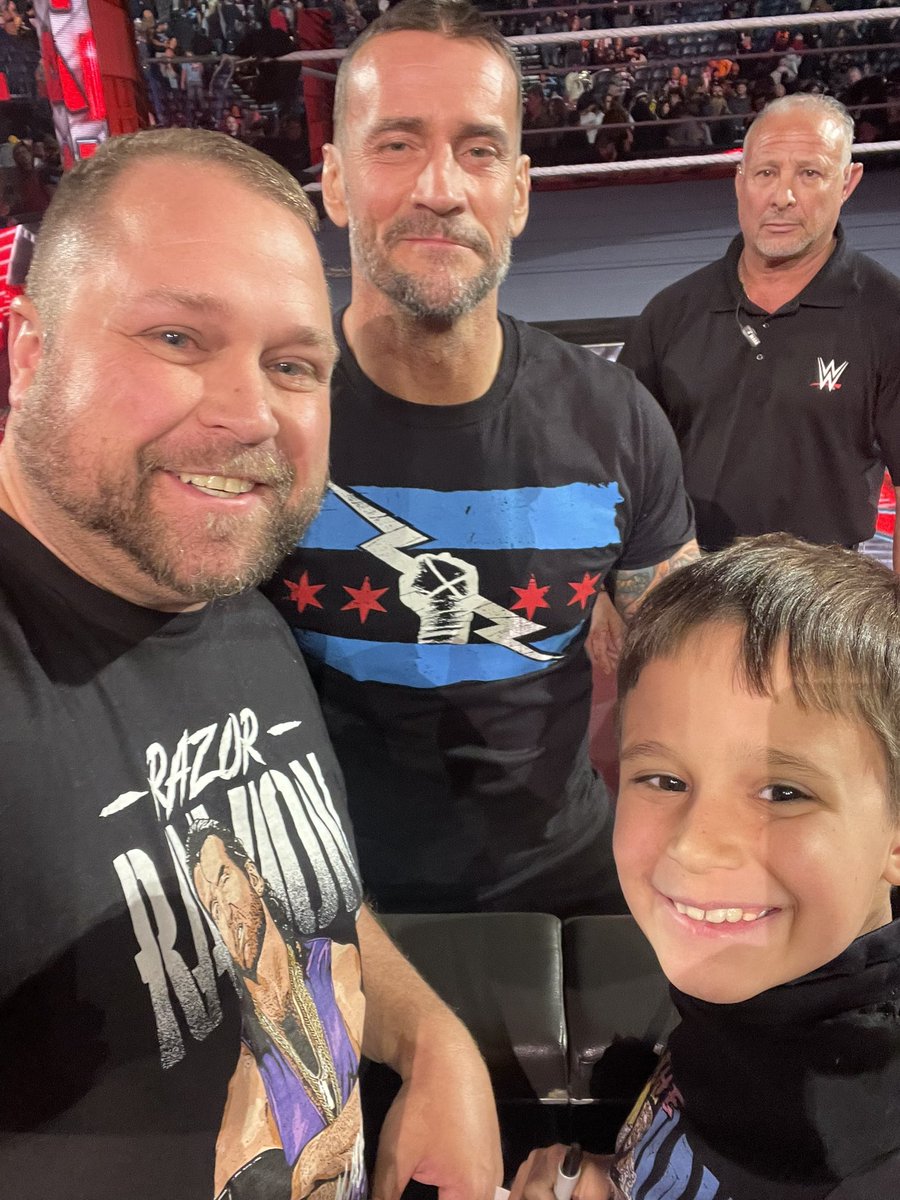 Drekennedy_83's tweet photo. The internet is a crazy place so let me say: he wasn’t a plant, he’s not a make a wish &amp; the autos aren’t going on eBay like ppl have suggested. Just a 7 yr old wrestling fan hanging w/ his dad at #WWERaw. Thanks to @RandyOrton, @CMPunk &amp; @CodyRhodes for taking the time! https://t.co/rtBiRvHNZm