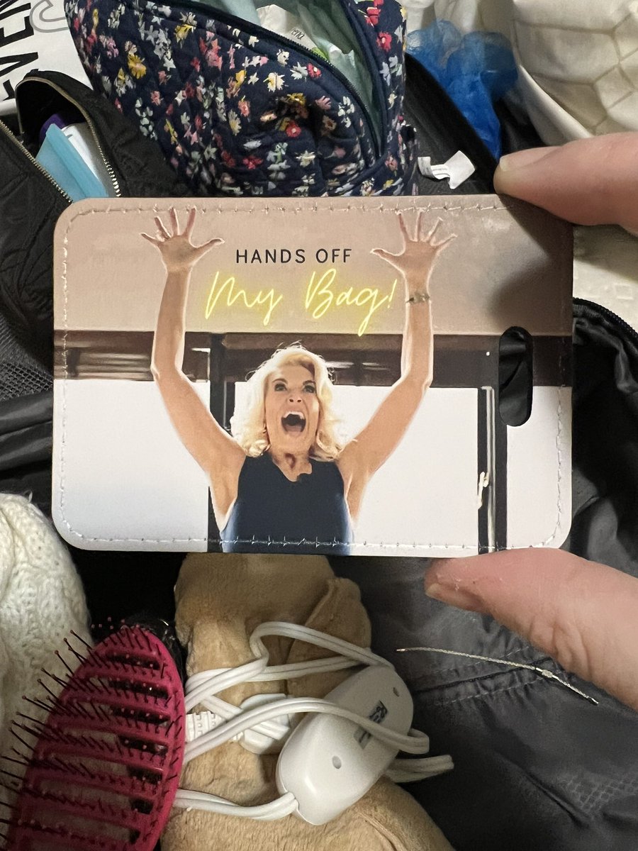 NikkiPoppinsRN's tweet photo. New luggage tag getting put on the carryon suitcase. #RebeccaWelton #MakeYourselfBig #TedLasso #LuggageTag #ImSoSleepyImOverTaggingThisTweet https://t.co/KvL4pbuawM