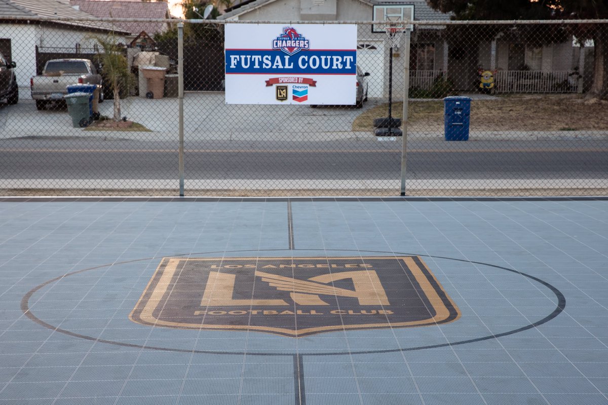 LAFC's tweet photo. A Force For Good ⚽️
 
Yesterday #LAFC, the LAFC Foundation and @Chevron celebrated the official donation of a new futsal court at Chipman Jr. High School in Bakersfield, CA. 

The school was also presented with a $10,000 donation and soccer equipment to enrich a sustainable program at the school for years to come. 

This marks the sixth futsal refurbishment Chevron has completed in partnership with LAFC.