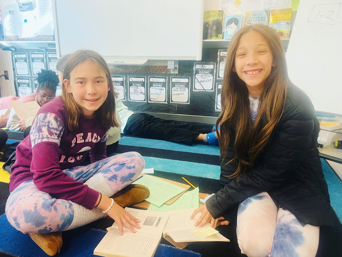 5th graders working hard in their book clubs! 📕🙂