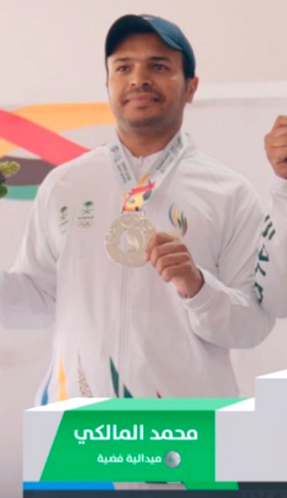 حقق الرامي الدولي : محمد بن احمد بن عمر الرباحي المالكي الميدالية الفضية في بطولة الرماية ضمن الاولمبياد السعودية والمقامة بمدينة الرياض ، متمنين له المزيد من الإنجازات و التطور فيما يحقق أهداف رؤية المملكة 2030
