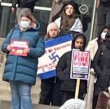 This is Toronto, Canada. Swastikas are NEVER appropriate at a protest. @TorontoMet #Antisemitism