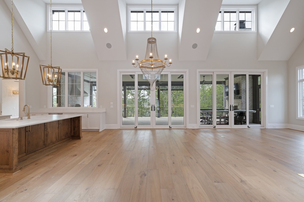 Step inside this beautiful home for ethereal views! 😇 Vaulted ceilings, refined and modern design, natural light flooding in…what is your favorite this about this grand living space?

#legendhomes #legendarylifestyles #customhomes #luxuryhomes #livealegend #nashvillerealestate