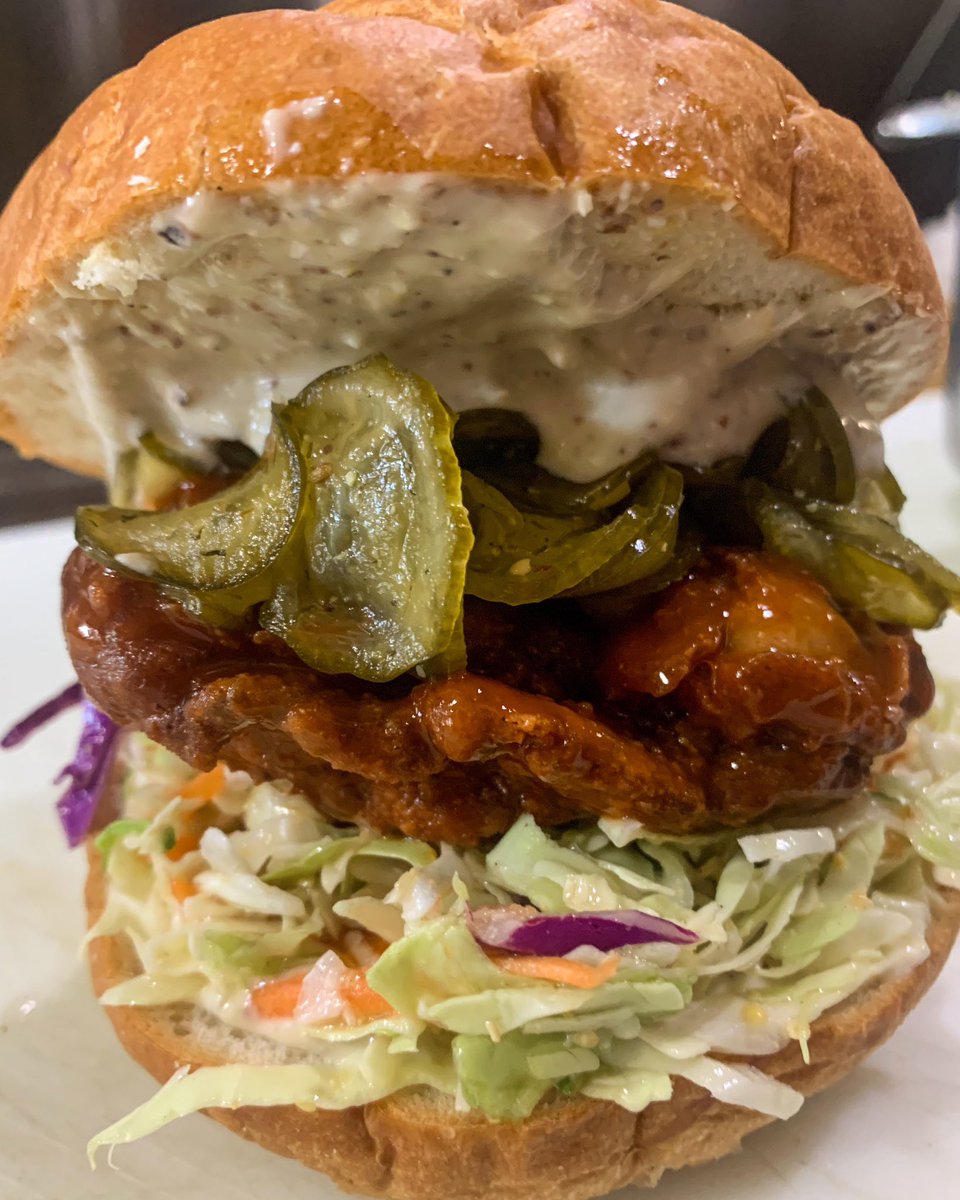smokingeorgebbq's tweet photo. It’s back! On special tomorrow- the Buffalo chicken sandwich. Made with buttermilk brined chicken thighs, breaded and fried then tossed in Franks hot sauce. With smoked blue cheese mayo, coleslaw and sweet pickles to top it off! https://t.co/hv5V19JP8K