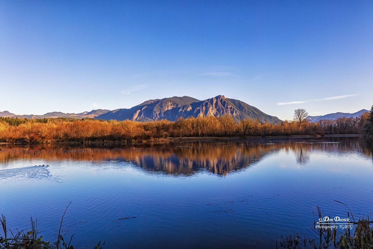 Golden hour afternoon reflection Mount Si near <a href="/SnoqualmieGov/">City of Snoqualmie</a> Washington.