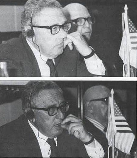 Henry Kissinger picks his nose and eats his booger while at a trade conference in Brazil (1992)