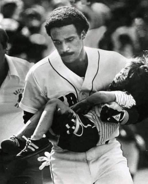 CalltoActivism's tweet photo. On August 8, 1982, a line drive foul ball hit a four year old boy in the head at Fenway. 

Jim Rice, realizing in a flash that it would take EMTs too long to arrive and cut through the crowd, sprang from the dugout and scooped up the boy. 

He laid the boy gently on the dugout floor, where the Red Sox medical team began to treat him.

When the boy arrived at the hospital 30 minutes later, doctors said, without a doubt that Jim's prompt actions saved the boy's life. Jim returned to the game in a blood-stained uniform. A real badge of courage. 

After visiting the boy in the hospital, and realizing the family was of modest means, he stopped by the business office and instructed that the bill be sent to him.

THIS is what a sports Hero looks like! ❤