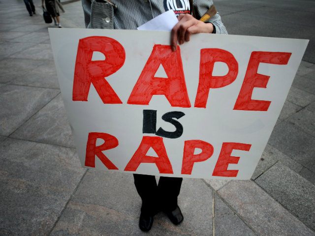 RonaldNHinton's tweet photo. Protesting Rape will be illegal soon. #Obama3rdterm https://t.co/akxBBJYqZ1