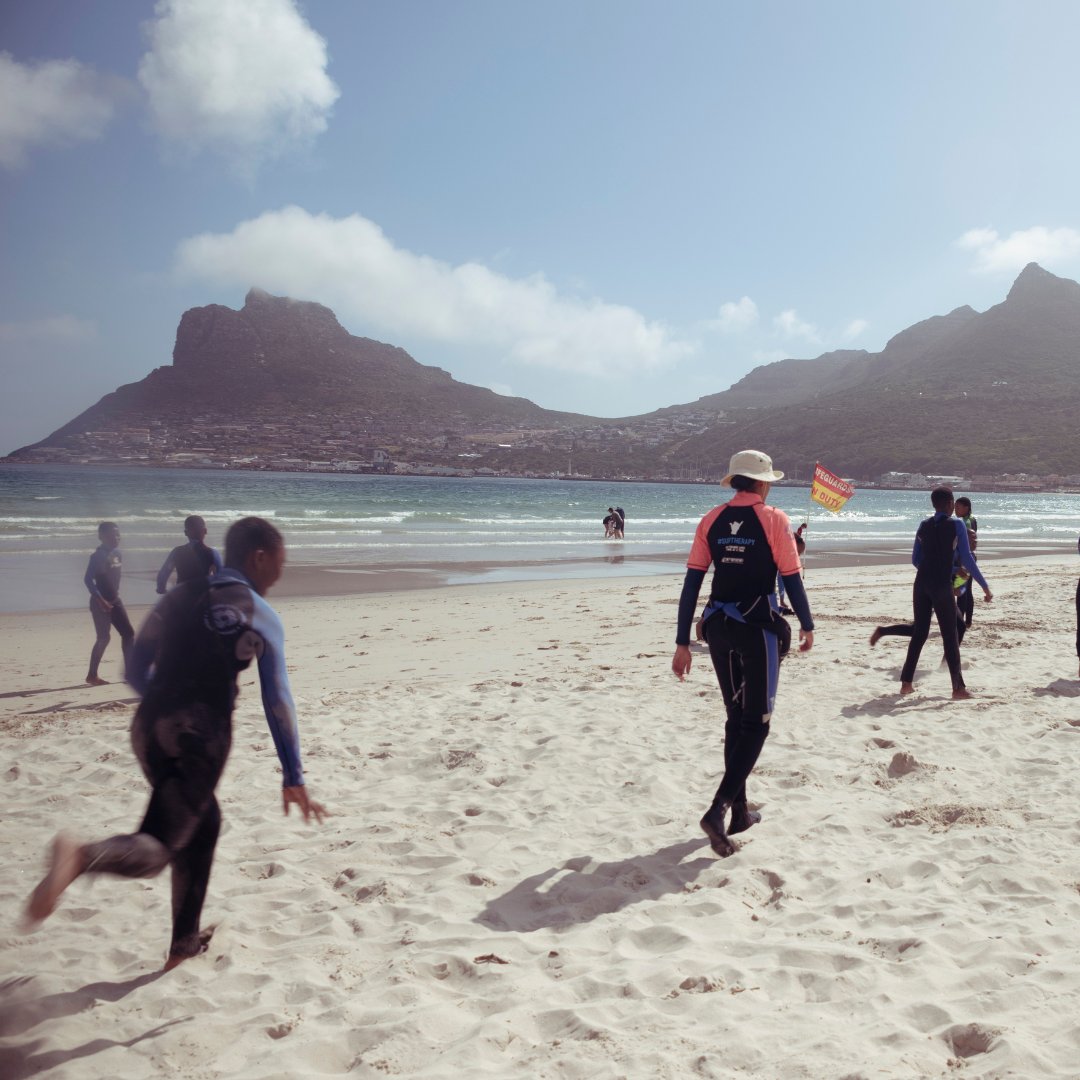 WavesforChange's tweet photo. Together with local partners,  we identify, train and equip Community Coaches at each of our 5 Beach Safe Hubs in the Western and Eastern Cape - Muizenberg, Monwabisi, Hout Bay, Gqeberha, and East London.

📸  Kaitlin Parry

#surftherapy #houtbay #wavesforchange https://t.co/9j49O2NmAo